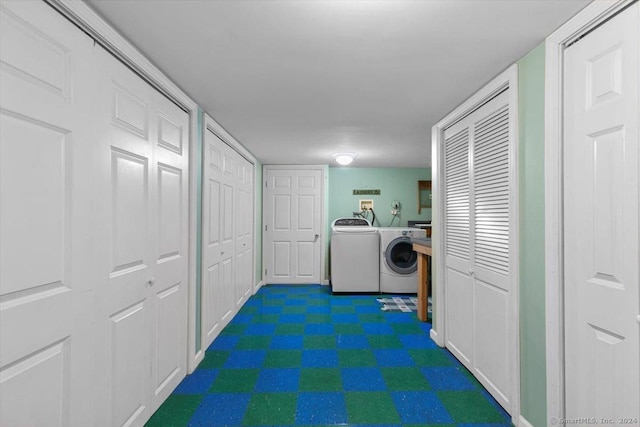 washroom with washer and clothes dryer