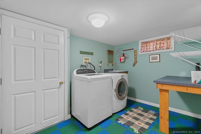 clothes washing area with independent washer and dryer