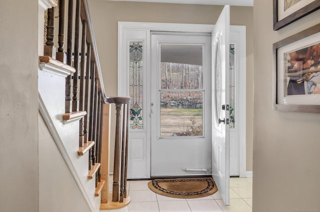 view of tiled foyer entrance