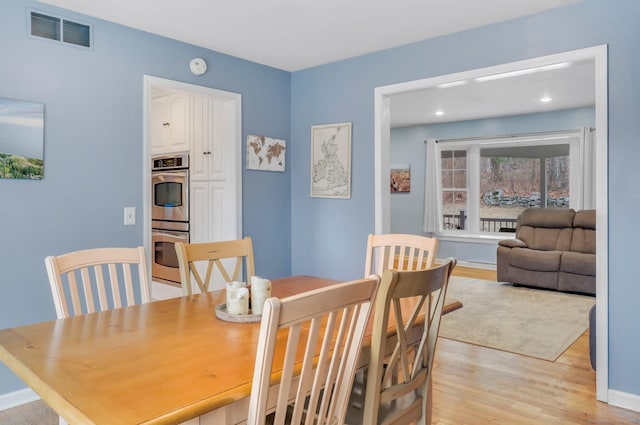 dining area featuring light hardwood / wood-style floors