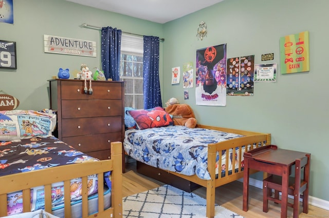 bedroom with light hardwood / wood-style flooring