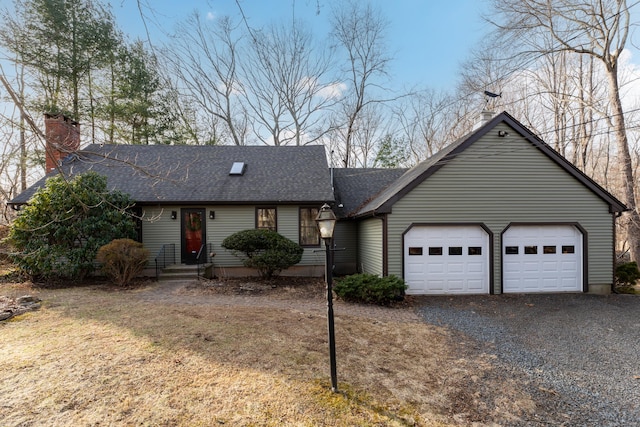 ranch-style home with a garage