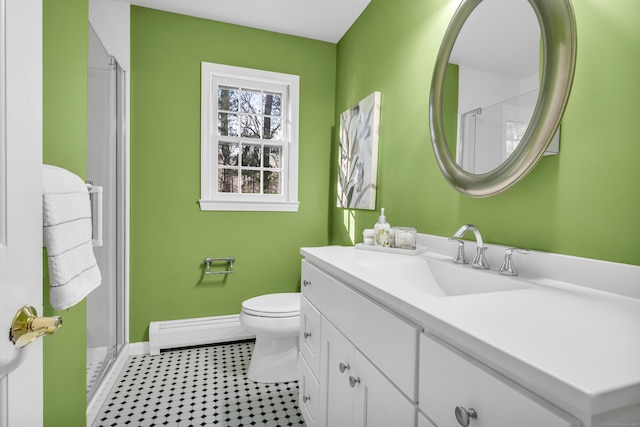 bathroom featuring vanity, a baseboard radiator, toilet, and a shower with door