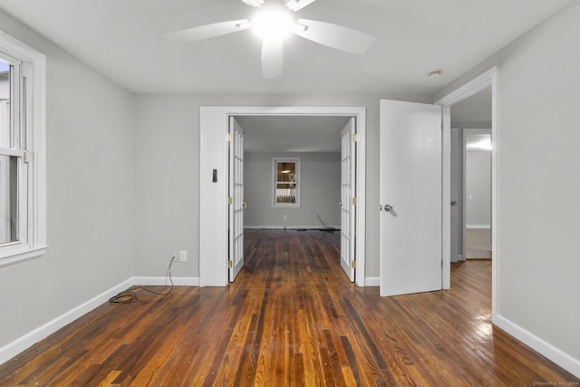 hall with dark wood-type flooring