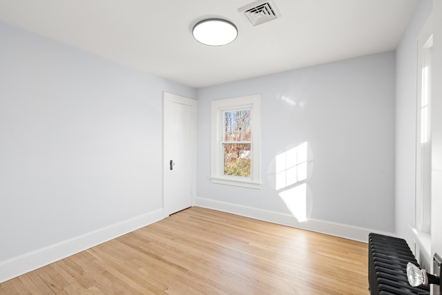 empty room featuring light hardwood / wood-style floors