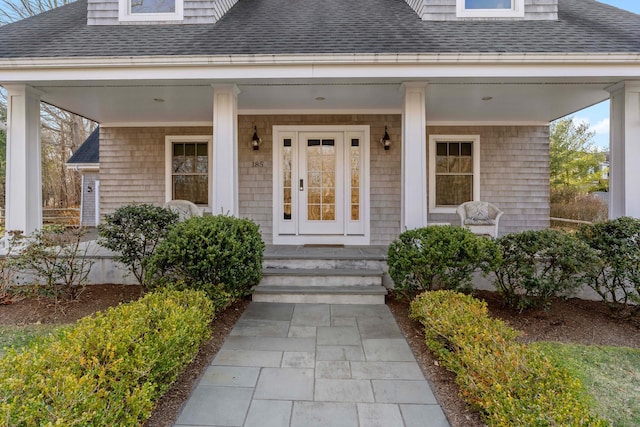 entrance to property featuring a porch