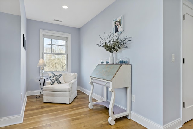 living area featuring light hardwood / wood-style flooring