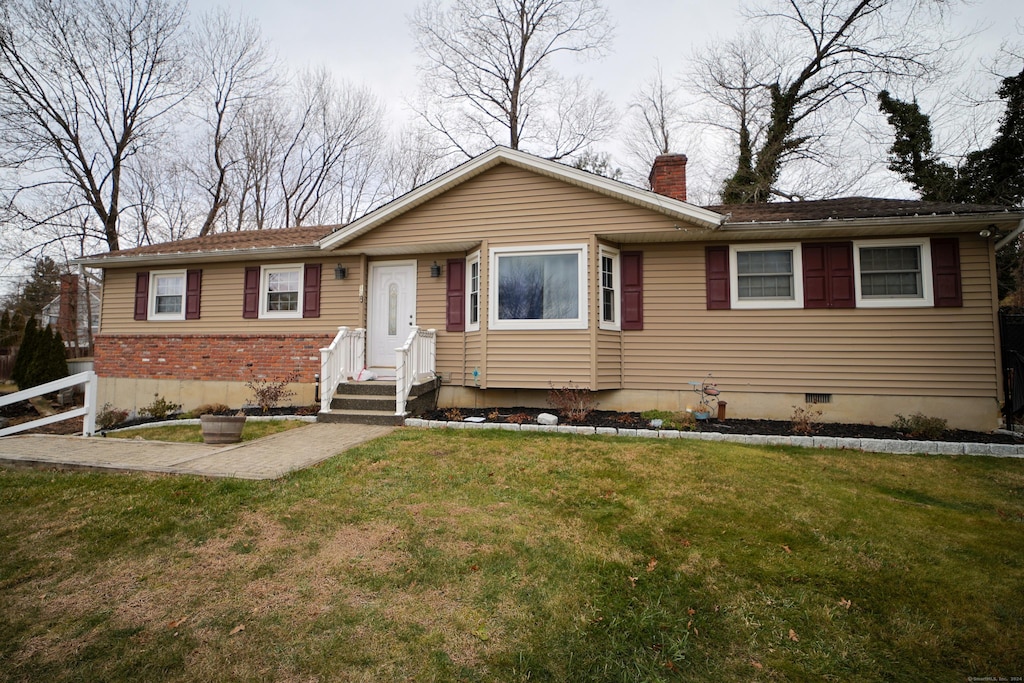 view of front of house with a front yard