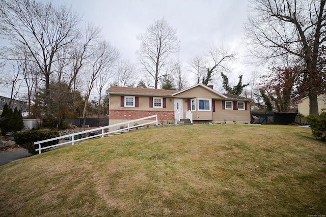 view of front of home with a front yard