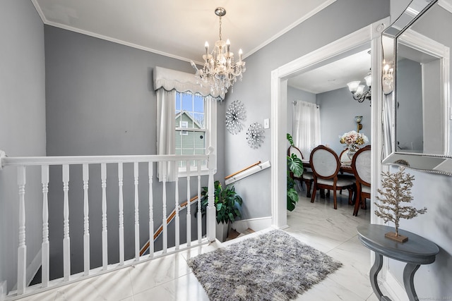 entrance foyer featuring crown molding and a notable chandelier