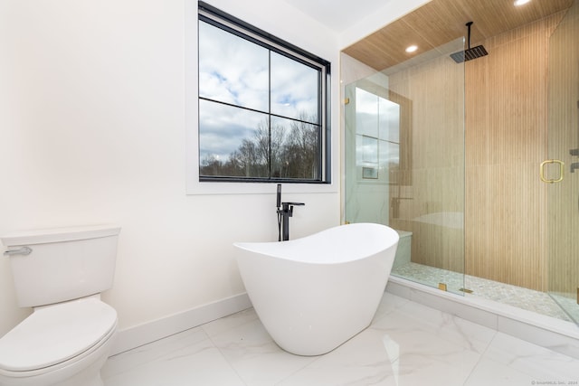 bathroom with separate shower and tub and toilet