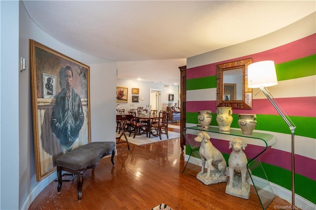 dining space featuring hardwood / wood-style flooring