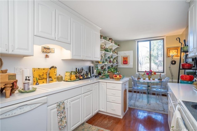 kitchen featuring white cabinetry, dishwasher, sink, dark wood-type flooring, and range