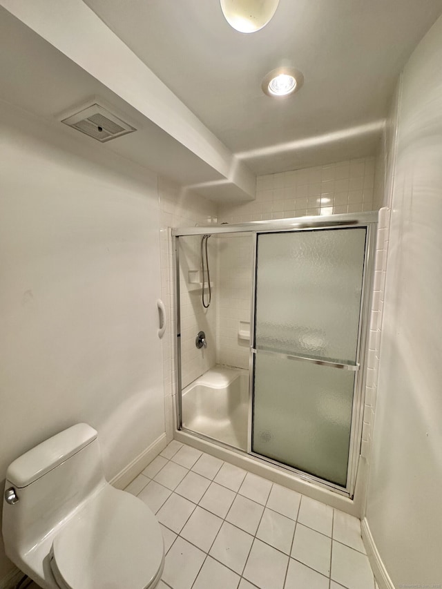 795 Prospect Ave Unit B-5, West Hartford, CT 06105 - bathroom featuring tile patterned flooring, a stall shower, toilet, and baseboards