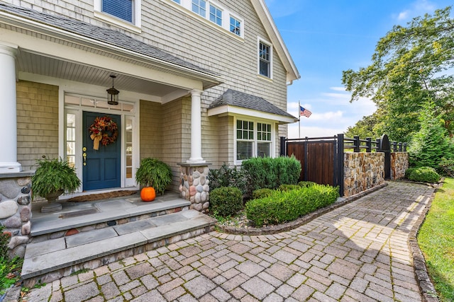 entrance to property with a porch