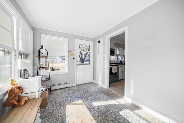 tiled foyer with a baseboard radiator and ornamental molding