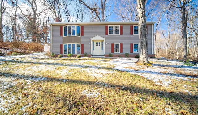 view of front of home with a front lawn