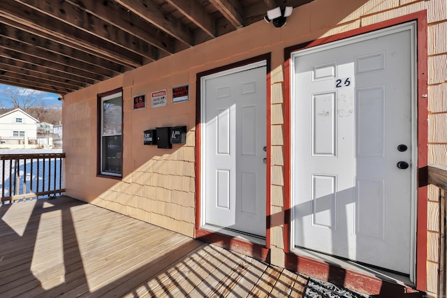 doorway to property with covered porch