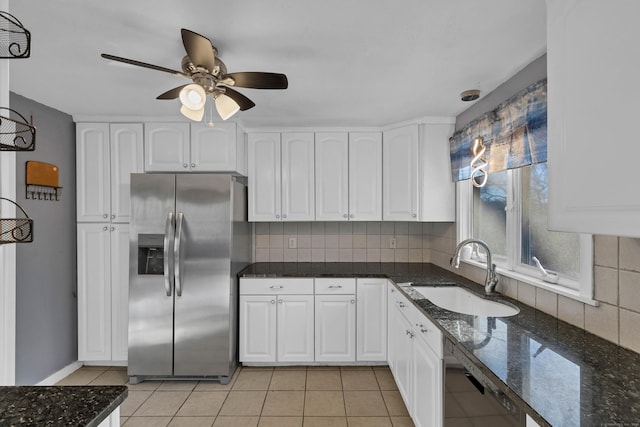 kitchen featuring sink, white cabinetry, and stainless steel appliances