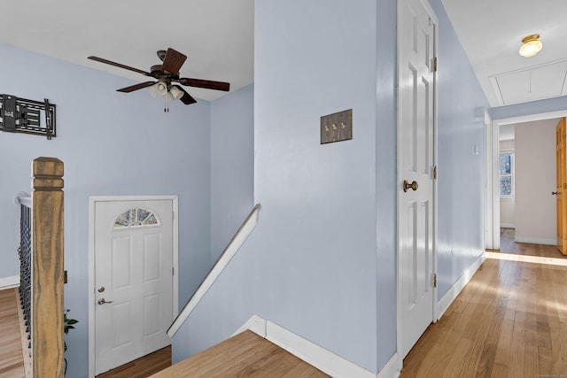 corridor with wood-type flooring