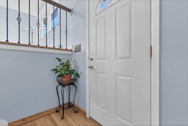 foyer with light hardwood / wood-style floors