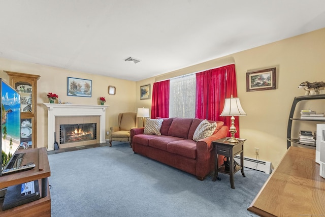 carpeted living room with a baseboard radiator and a tiled fireplace