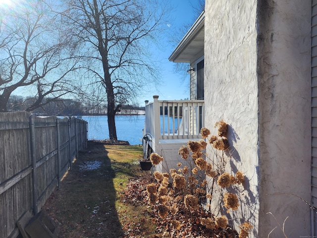 view of yard with a water view