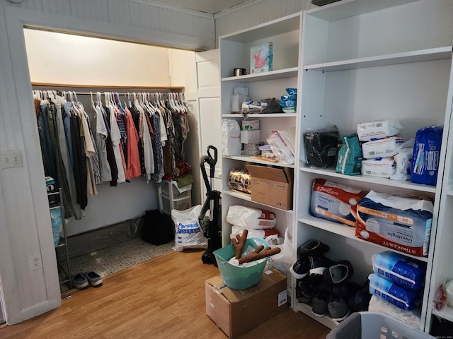 spacious closet featuring hardwood / wood-style floors