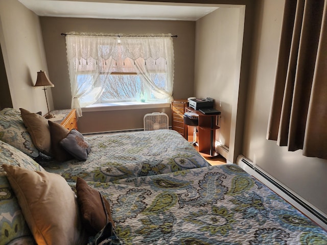 bedroom with a baseboard radiator