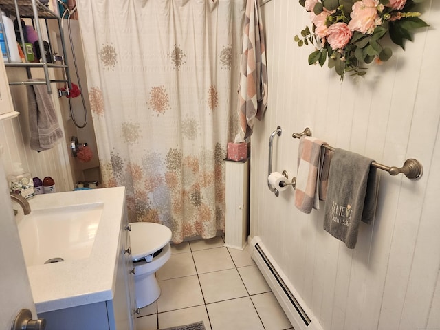 bathroom featuring baseboard heating, tile patterned floors, wood walls, toilet, and vanity