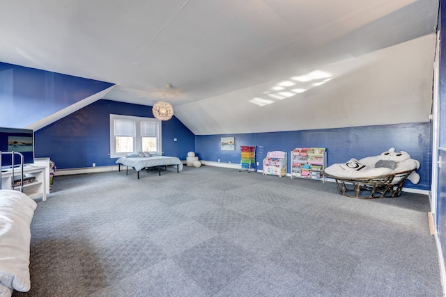 rec room with carpet and vaulted ceiling