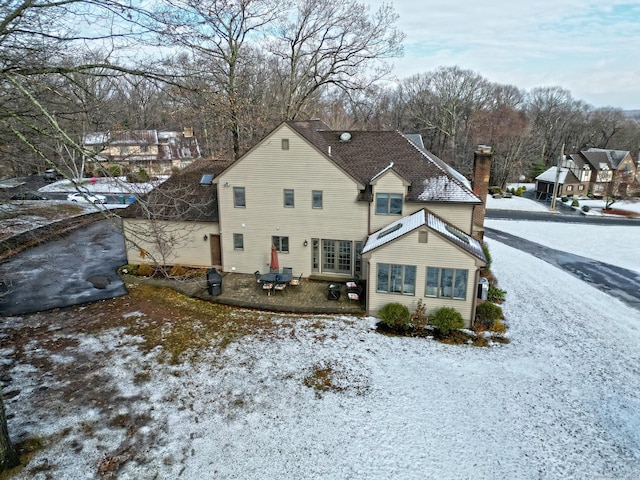 view of snow covered property