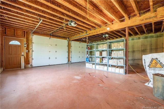 garage featuring a garage door opener