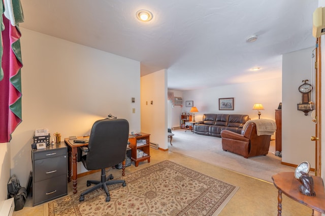 carpeted office space with a baseboard heating unit