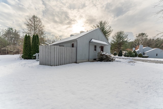 view of snow covered property