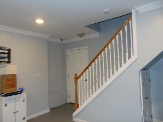 interior space with crown molding