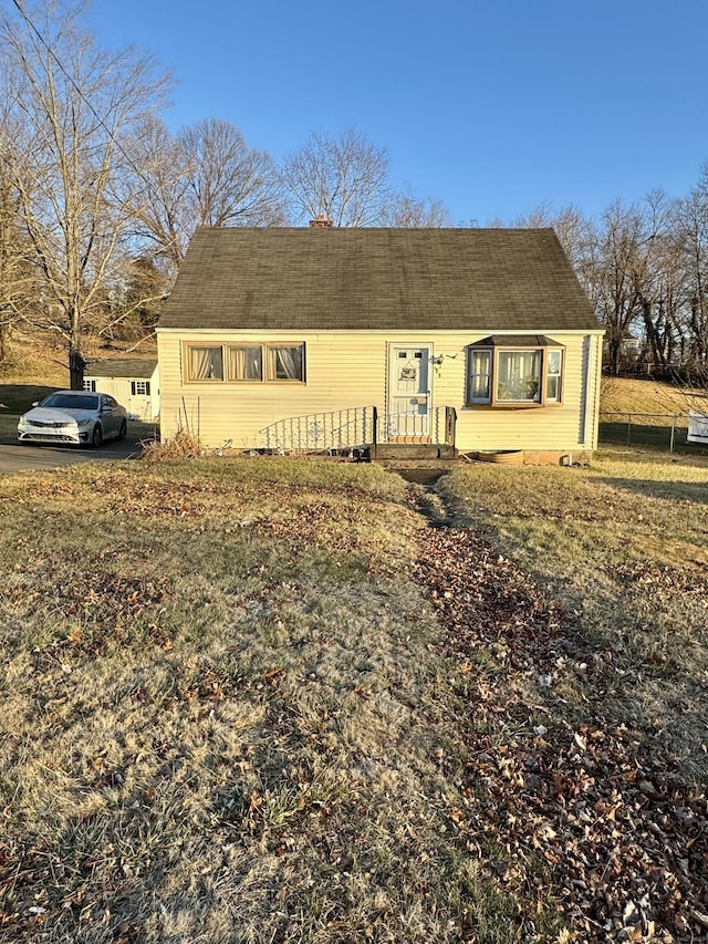 view of front of house with fence