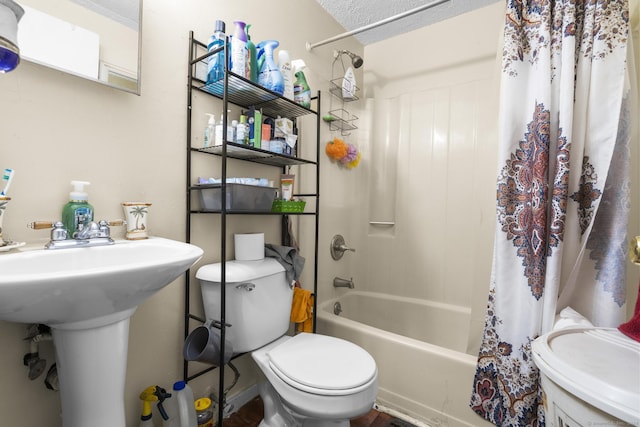 bathroom with shower / tub combo, a textured ceiling, and toilet