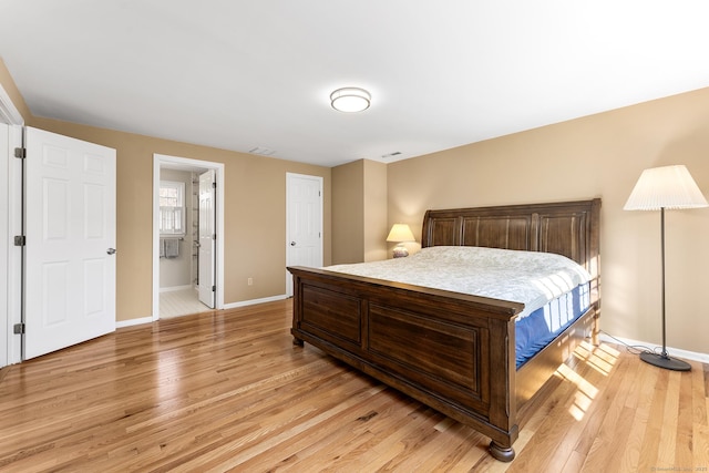 bedroom featuring light hardwood / wood-style floors