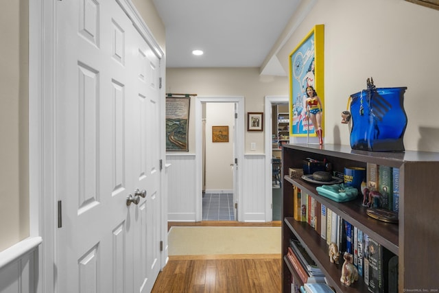 hallway featuring wood-type flooring