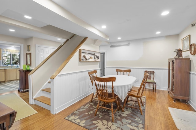 dining space featuring light hardwood / wood-style floors