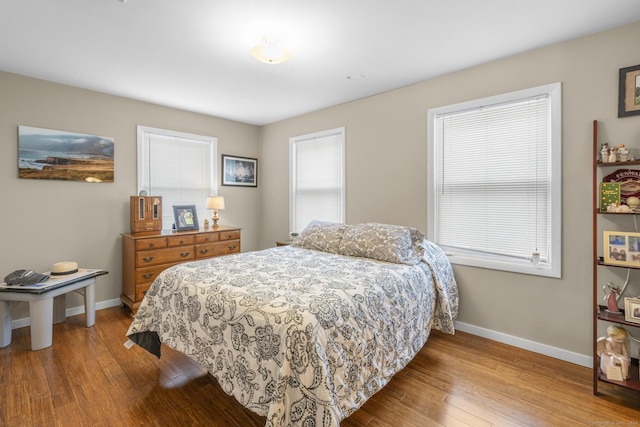 bedroom with light hardwood / wood-style floors