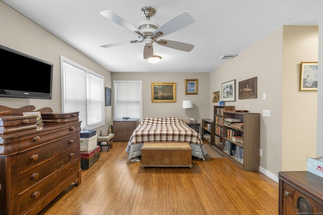 bedroom featuring ceiling fan and light wood-type flooring