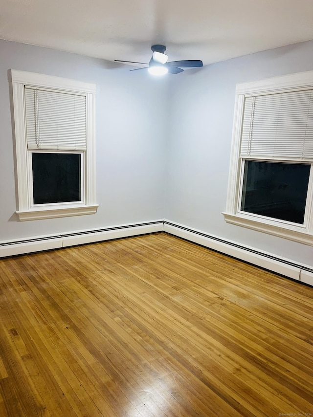 unfurnished room featuring ceiling fan and wood-type flooring