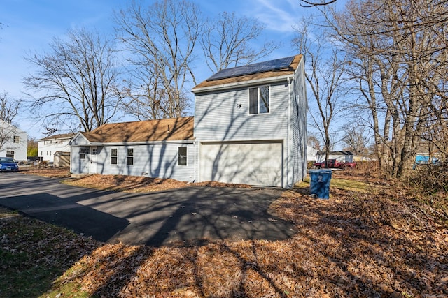 exterior space featuring a garage