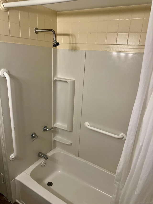 bathroom featuring shower / bath combination with curtain