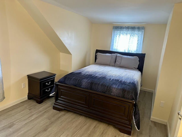 bedroom featuring light wood-type flooring