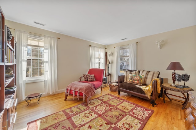 living area featuring light hardwood / wood-style floors