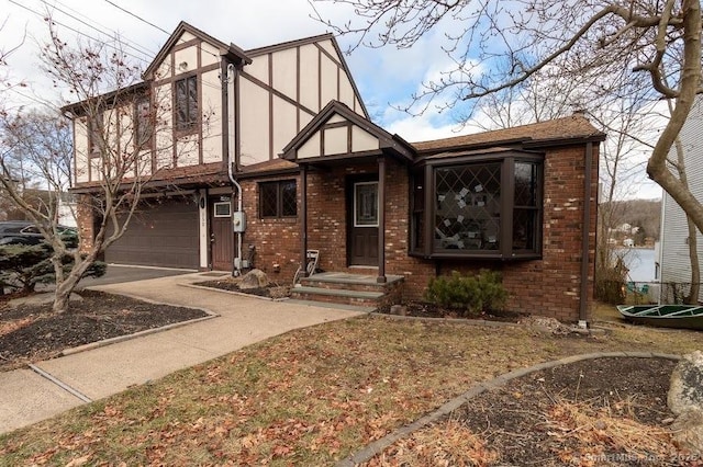 tudor-style house with a garage