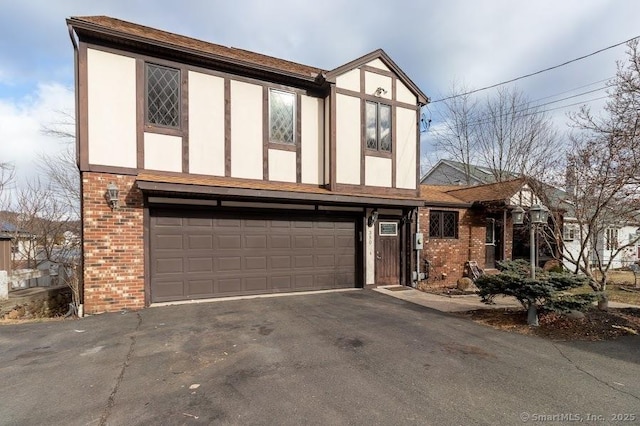 tudor house with a garage